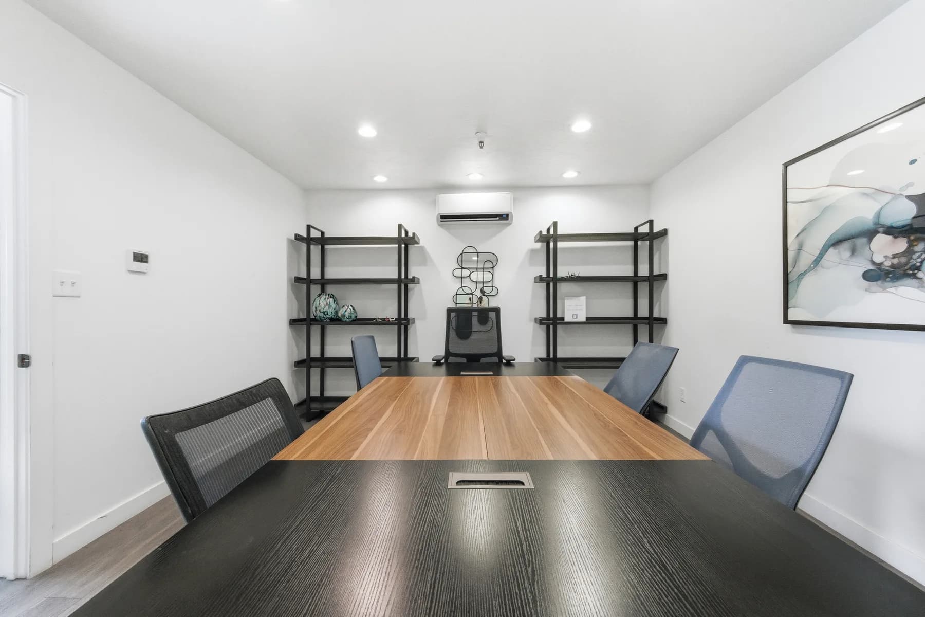 Long conference table in a private meeting room