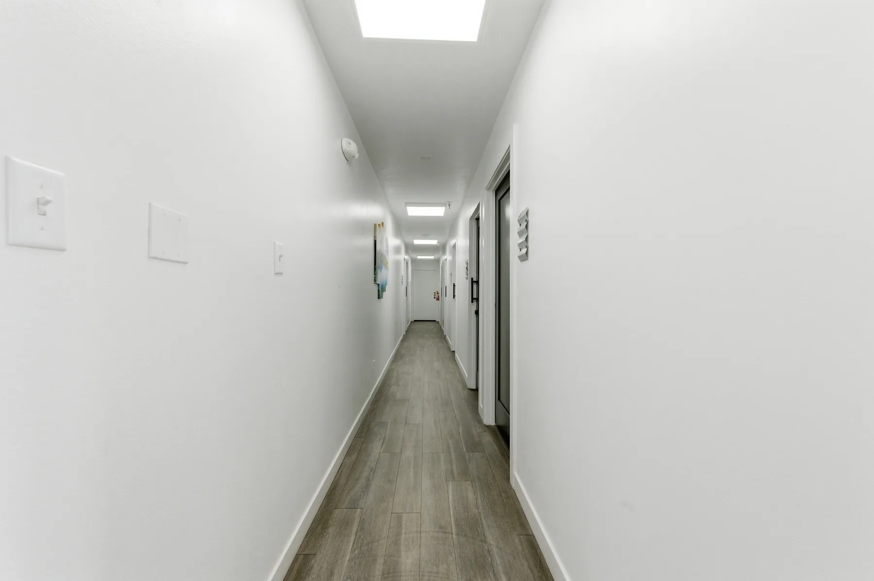 Hallway connecting private offices