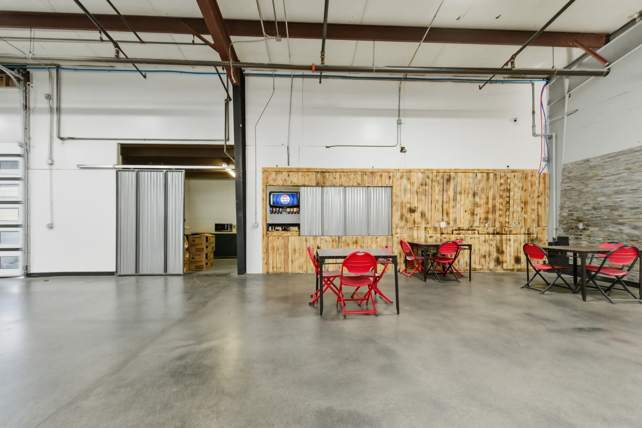 Soda bar and casual seating inside The Arena
