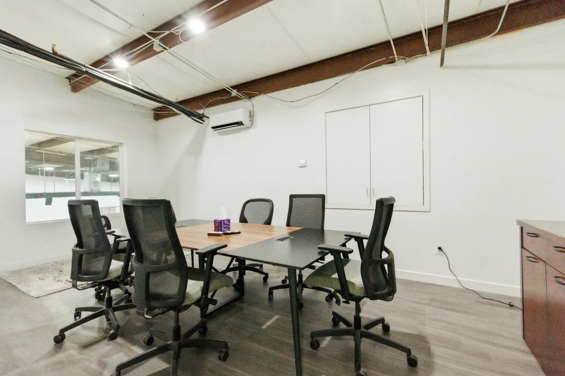 Small meeting room inside The Anata Building